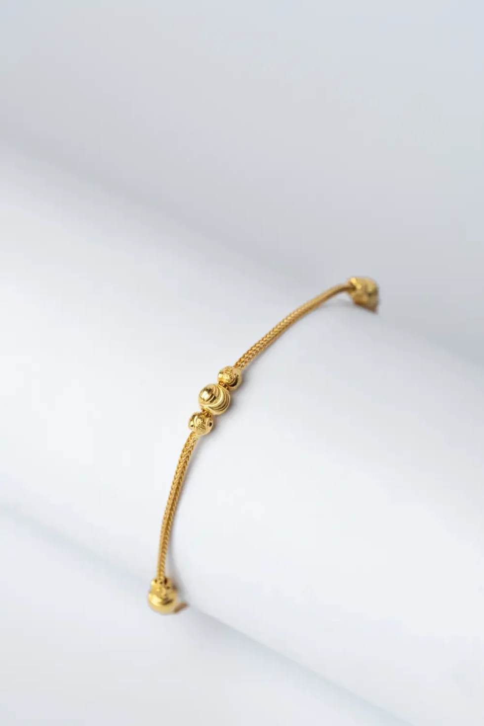 21K Balls Designed Bracelet for Women in Yellow Gold
